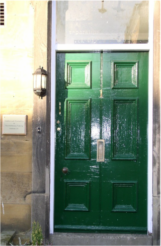 Picture of Scarborough Institute dark green front door.